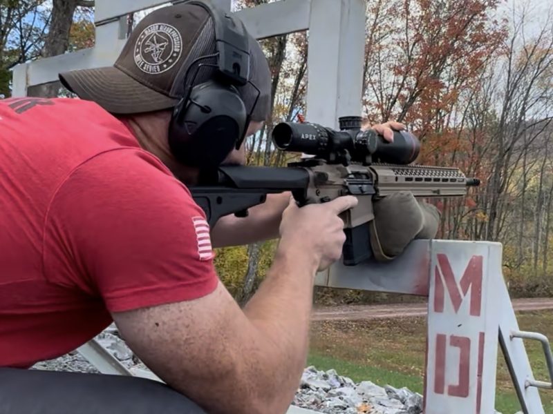 scoped gas gun shooter during designated marksman rifle course